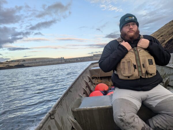 Man in boat on reservoir